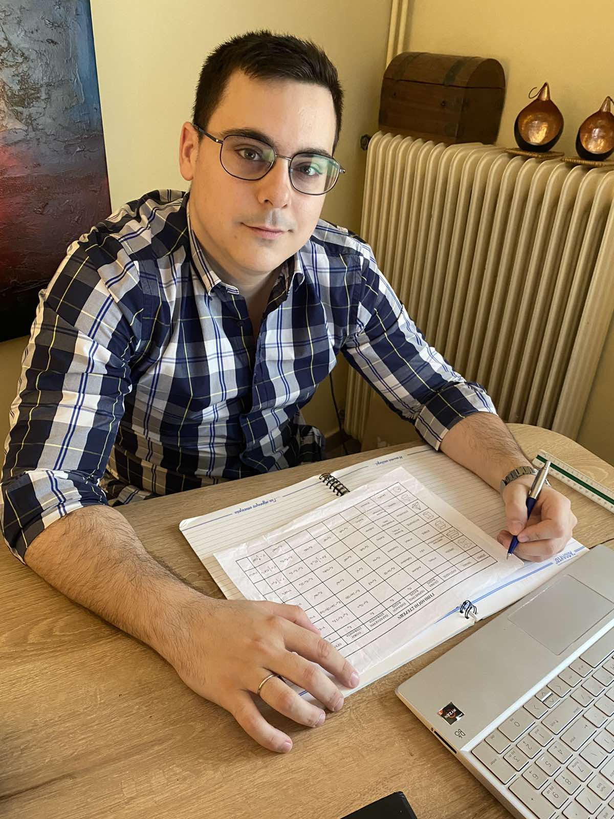 Alexandros Giakalis - Tutoring at His Desk