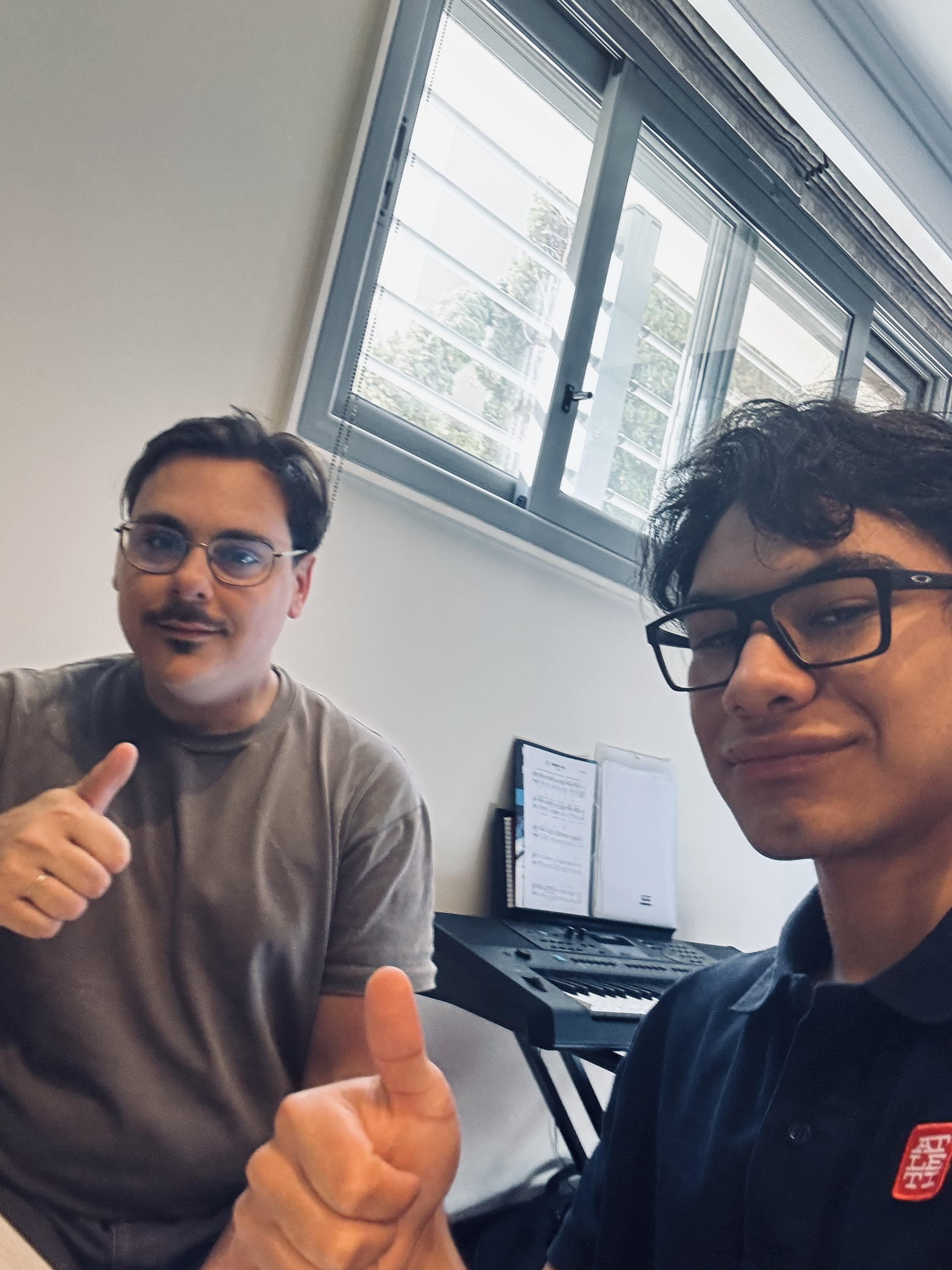Alexandros Giakalis working through a Further Pure Math problem with a student during a private in person lesson
